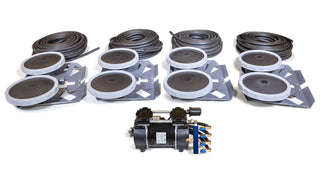 Collection of mechanical components including belts and pulleys on a white background